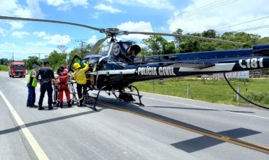 Helicóptero do Saer presta socorro a vitima de acidente envolvendo moto e caminhão